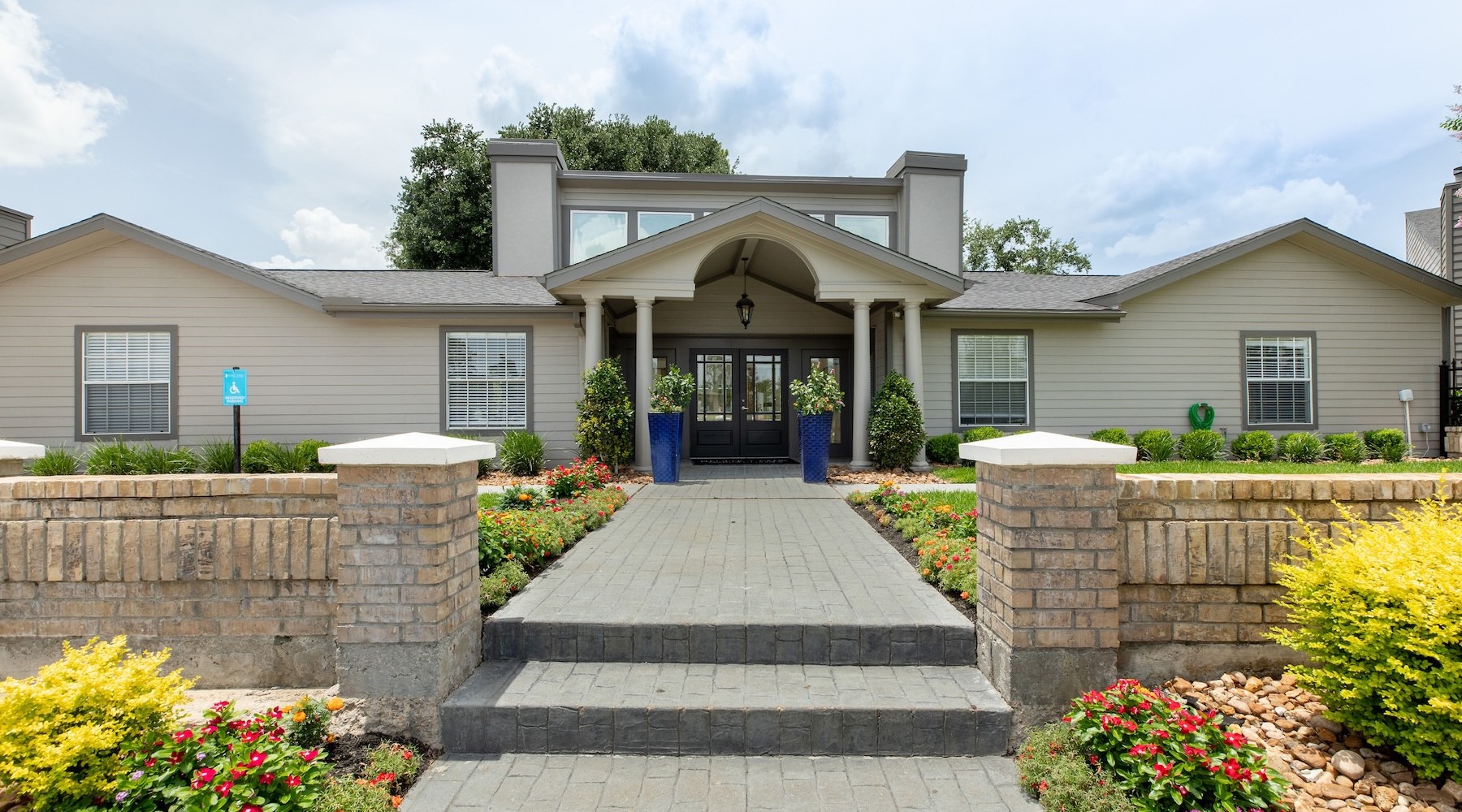 The essence of exceptional living the entrance of a leasing office