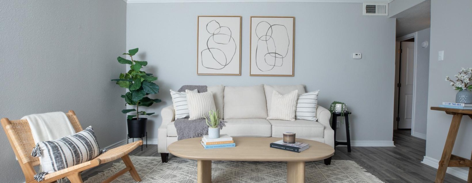 a living room with a couch and coffee table