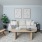 a living room with a couch and coffee table