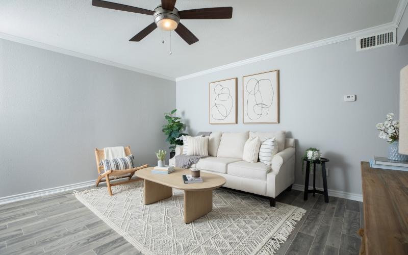 a living room with a couch and a table